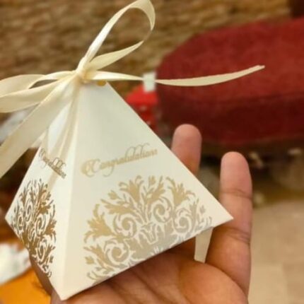 White And Goldan Triangle With Ribbon